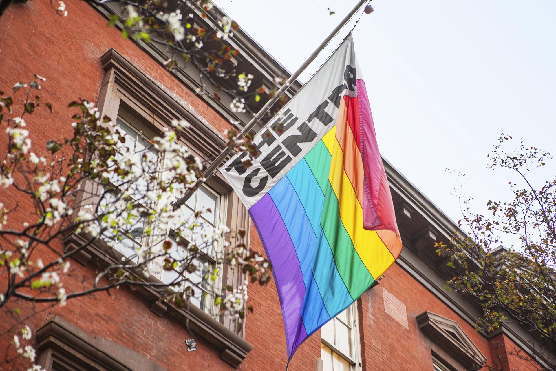 Pride flag and the exterior of The Lesbian, Gay, Bisexual & Transgender Community Center in West Village, Manhattan